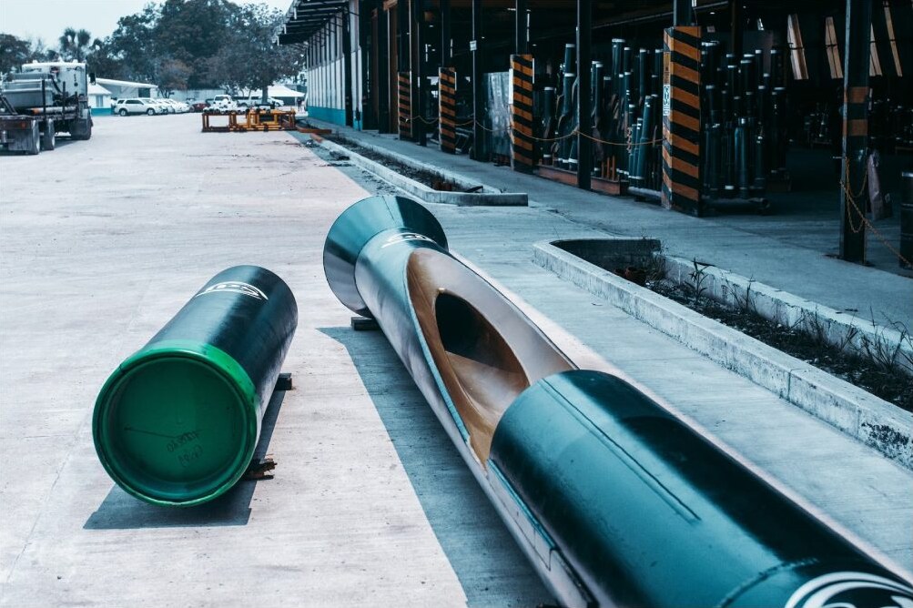 Casing with centralizers staged in the yard
