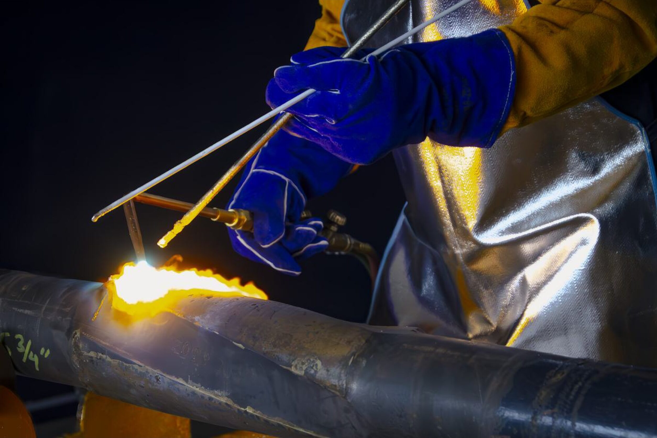 Torch cutting a conductor pipe