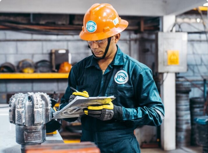 Engineer reviewing PDC bit specifications