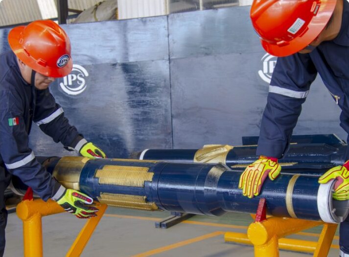 Crew preparing a hole enlargement assembly