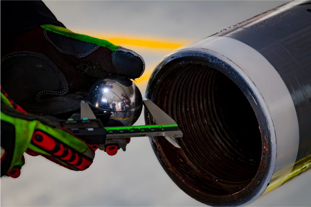 Technician checking a valve seat inside a tool body