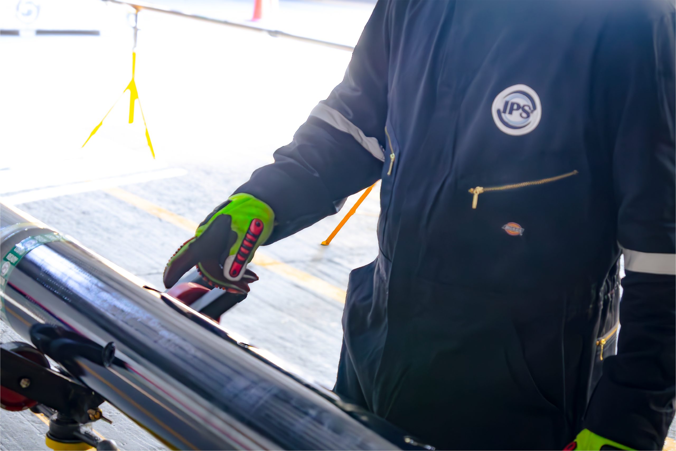 Technician handling a shock tool in the workshop