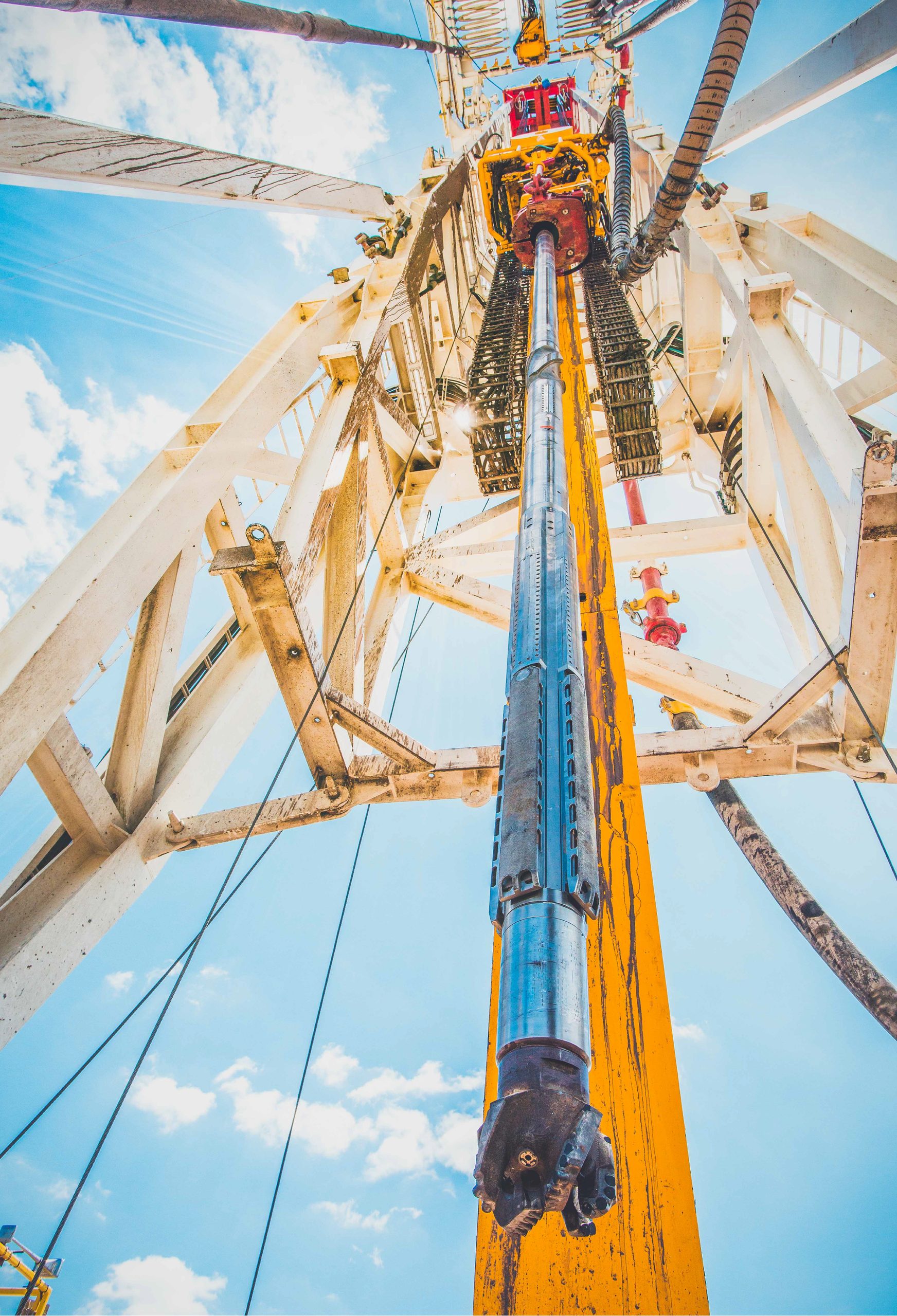 Drilling rig mast and top drive seen from the rig floor